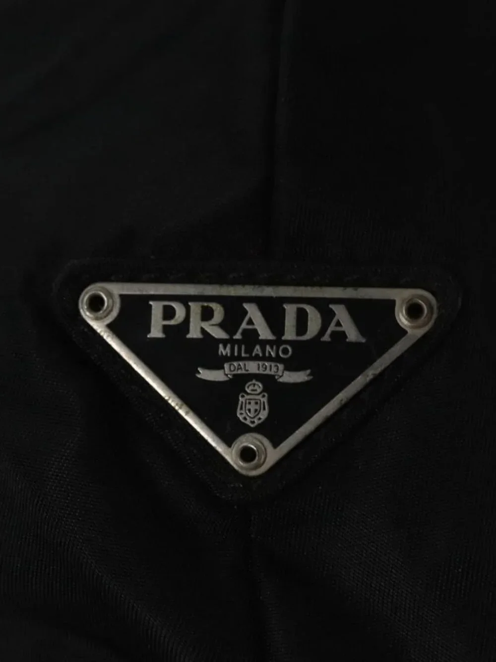 Prada brand	prada color	black